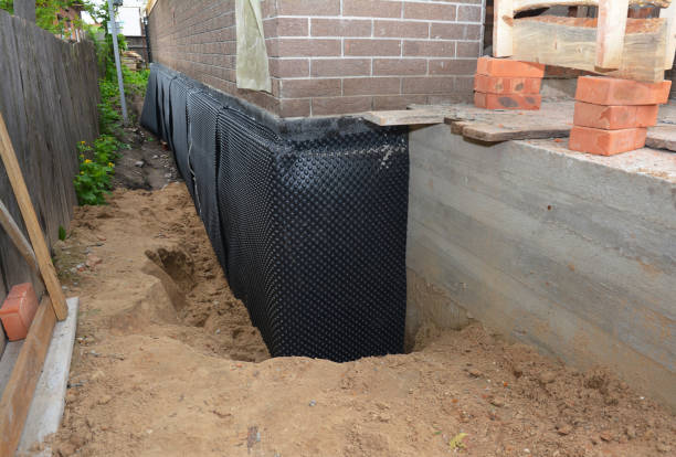 Happy homeowners after waterproofing job in Rossburg